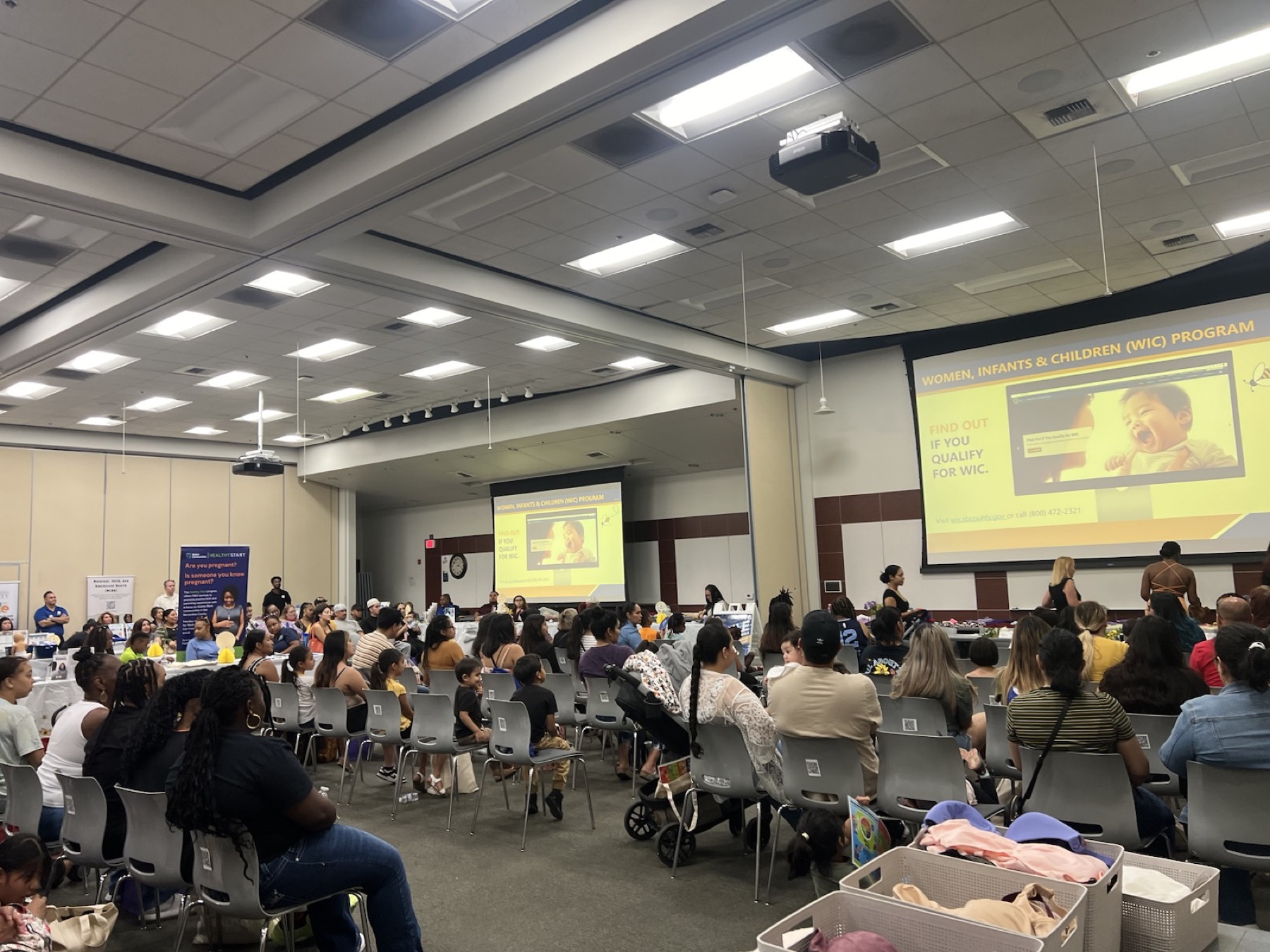 Families gathered for a community WIC event and breastfeeding education program.