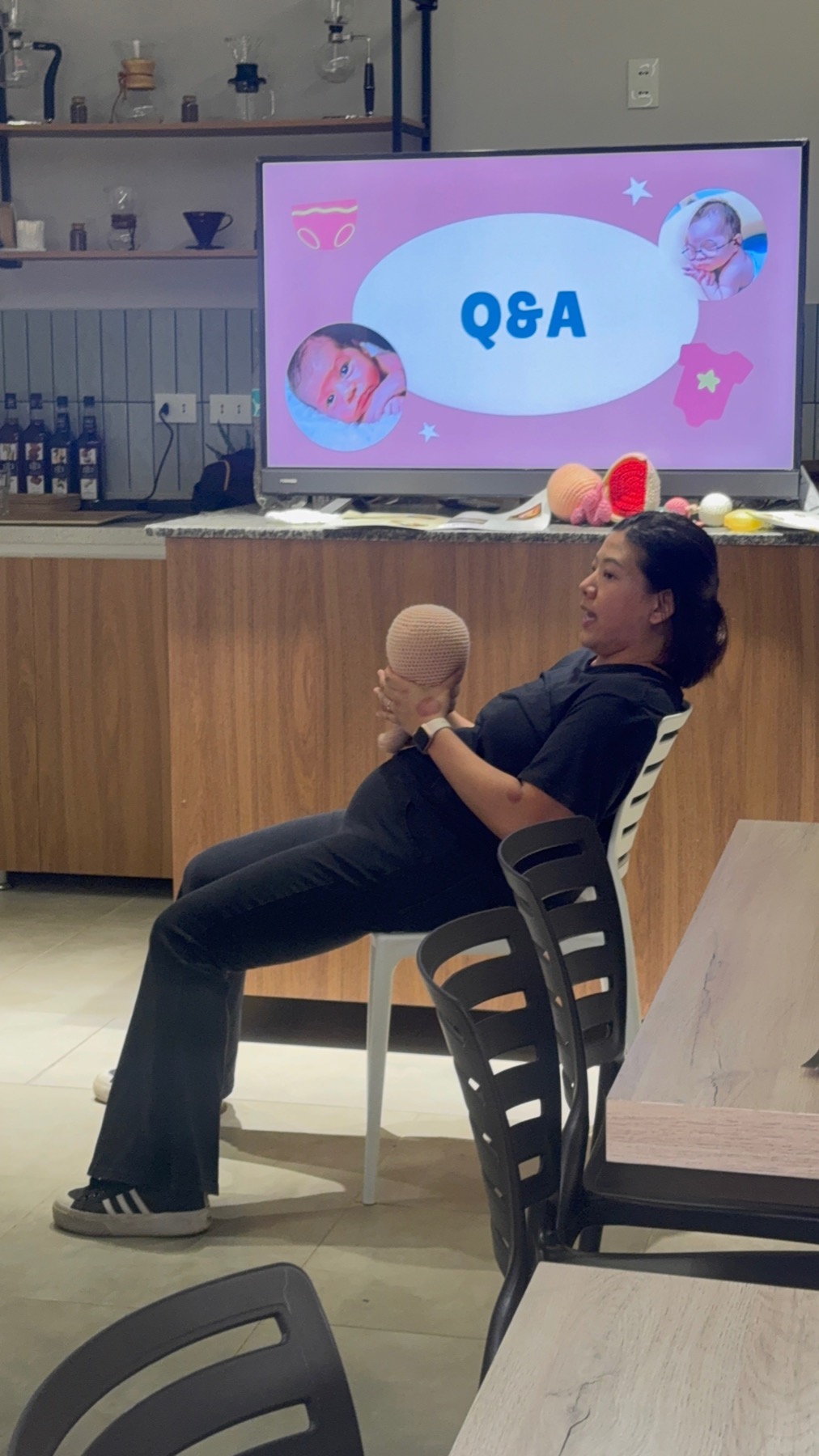 Melody answering questions during a workshop.